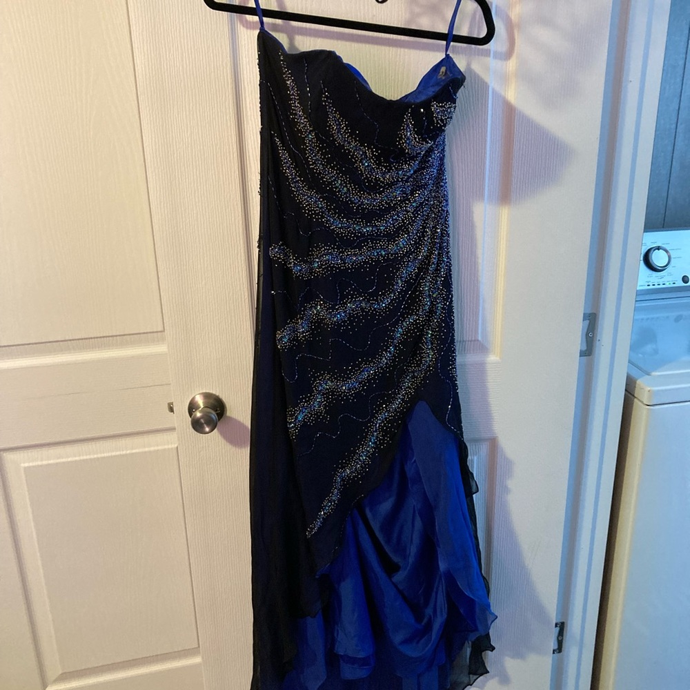 RIVA DESIGNS- Only Worn Once. 100% Silk Lining 100% Polyester
